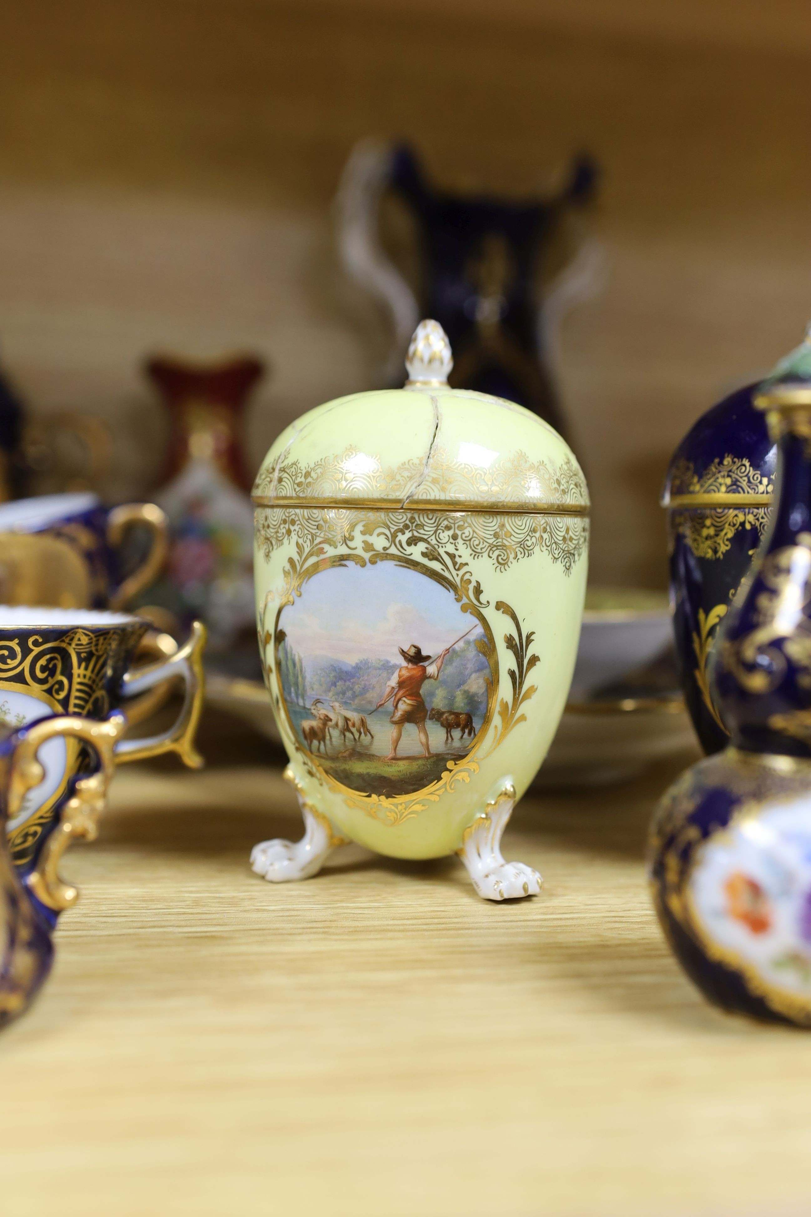 A selection of 19th century porcelain including Meissen cups, covers and saucers, Newhall type bowls and saucers and others